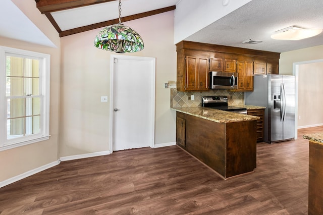 kitchen featuring hanging light fixtures, decorative backsplash, appliances with stainless steel finishes, brown cabinetry, and light stone countertops