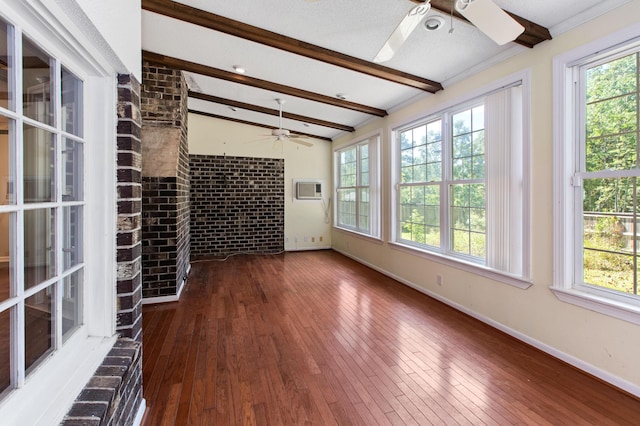 interior space with a wealth of natural light, dark wood-style floors, and beam ceiling