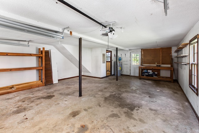 garage featuring baseboards and a garage door opener