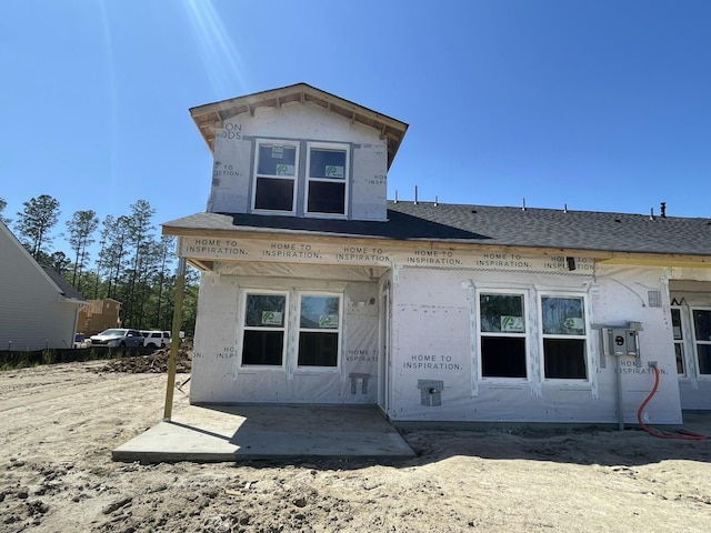 rear view of house with a patio