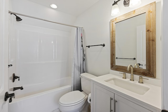 bathroom with vanity, shower / bath combo with shower curtain, and toilet