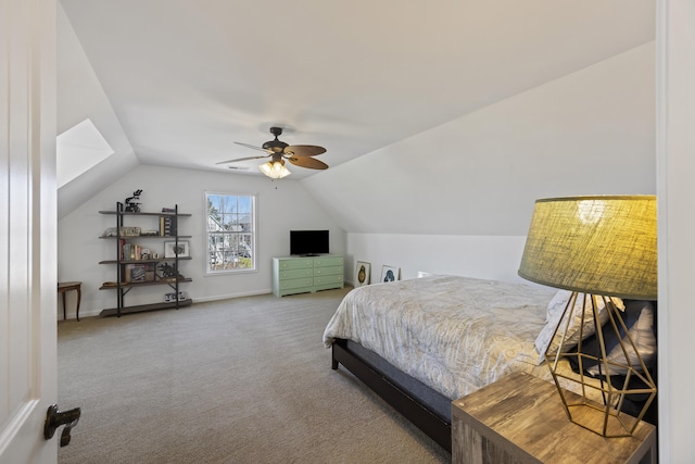 bedroom featuring carpet, ceiling fan, lofted ceiling, and baseboards