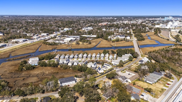 aerial view featuring a residential view and a water view