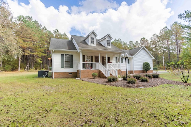 cape cod home featuring a porch and a front yard