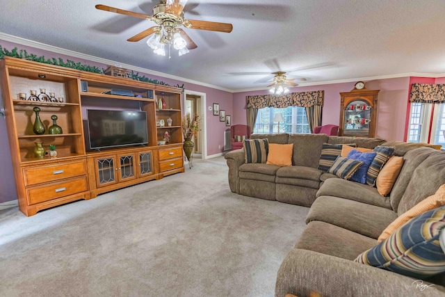 carpeted living room featuring ornamental molding, a textured ceiling, and ceiling fan