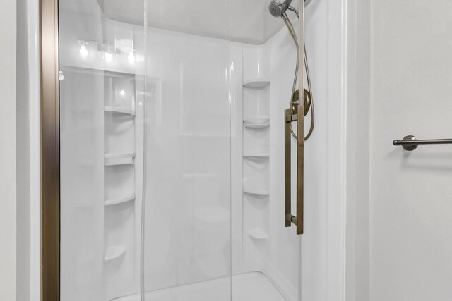 spacious closet with wood finished floors