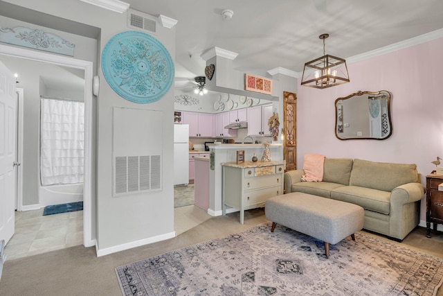 living room with light carpet, ceiling fan with notable chandelier, and crown molding