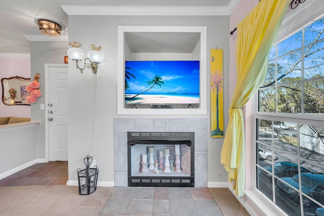 living room featuring ornamental molding, tile patterned floors, and a fireplace