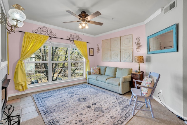 tiled living room with crown molding and ceiling fan