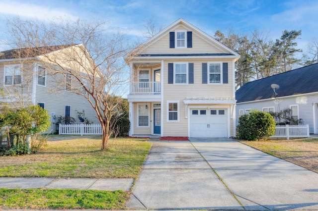 view of front of house featuring driveway, a balcony, an attached garage, fence, and a front yard