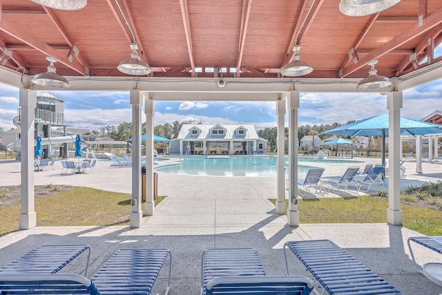 view of swimming pool featuring a patio area