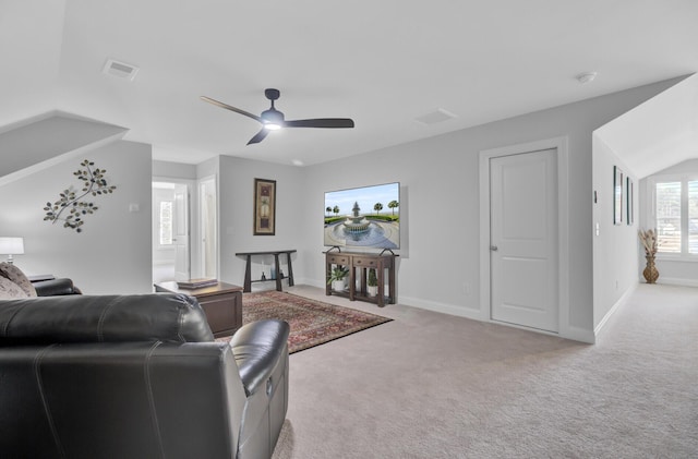 living room with ceiling fan and light colored carpet