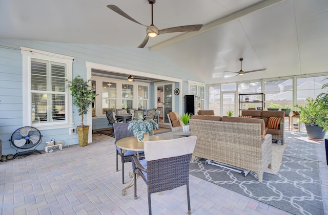 view of patio featuring ceiling fan and an outdoor living space