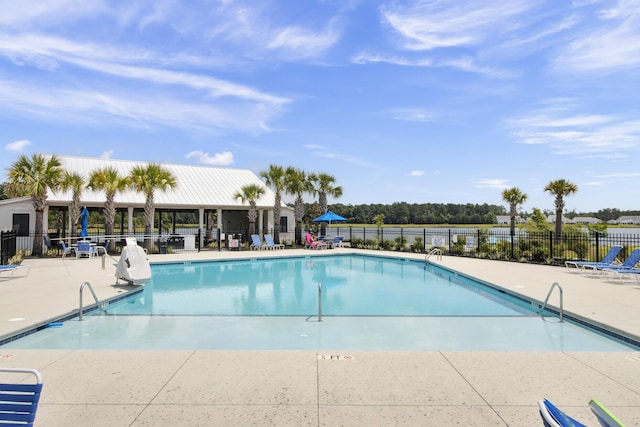 view of swimming pool with a patio area