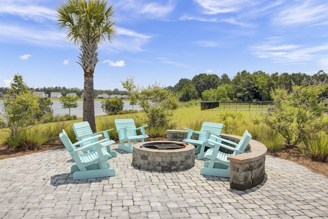 view of patio with an outdoor fire pit