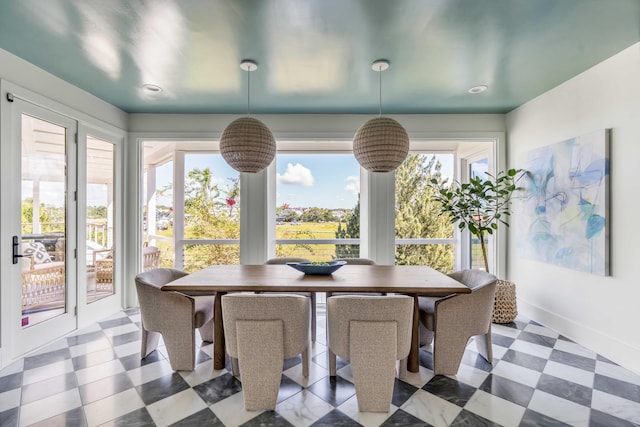 dining space with plenty of natural light