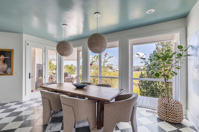 dining area featuring a healthy amount of sunlight