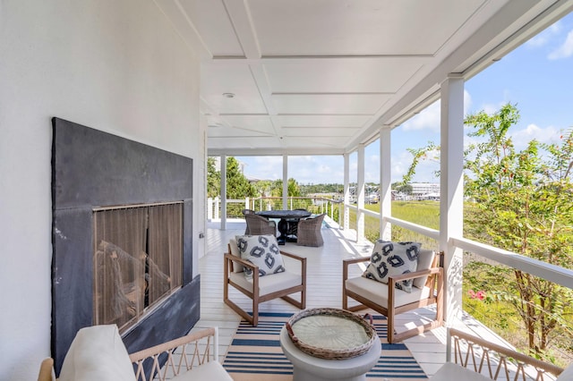 sunroom featuring a healthy amount of sunlight