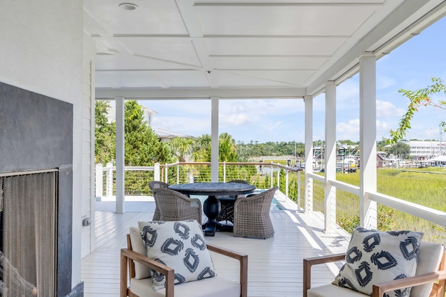 sunroom with plenty of natural light