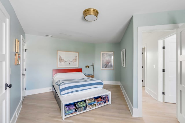 bedroom featuring light hardwood / wood-style floors