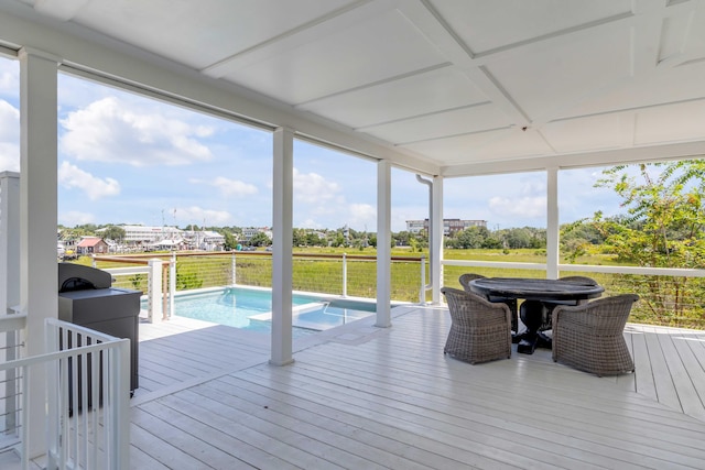 sunroom with a healthy amount of sunlight