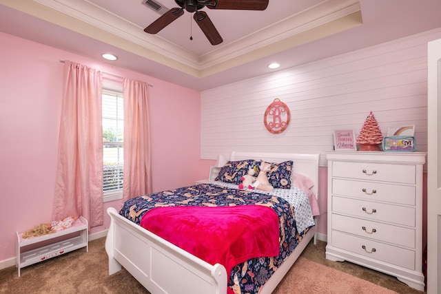 carpeted bedroom featuring visible vents, crown molding, baseboards, ceiling fan, and recessed lighting