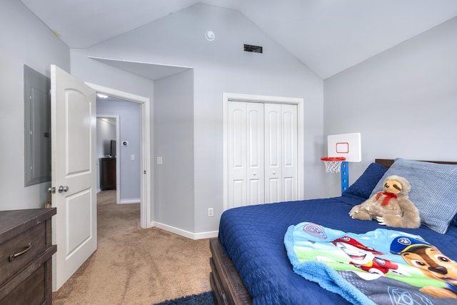 bedroom featuring a closet, baseboards, high vaulted ceiling, and light carpet