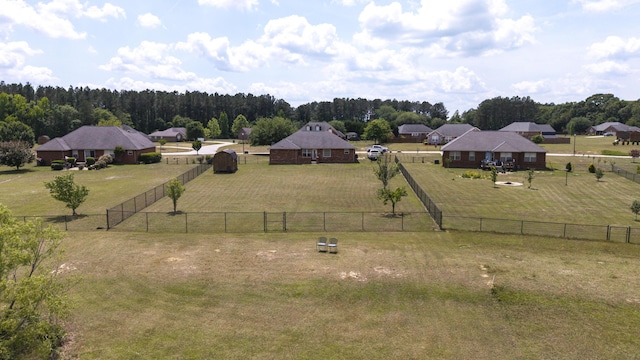 aerial view featuring a forest view and a rural view
