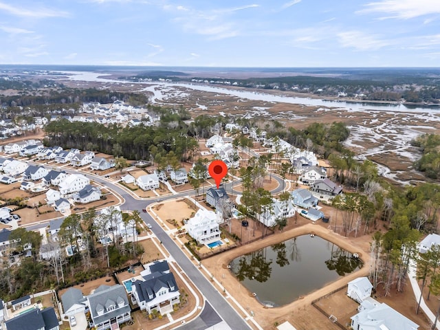 drone / aerial view featuring a water view