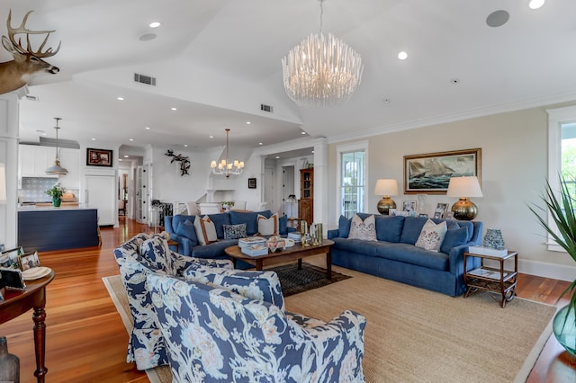 932 Middle St, Sullivans Island, SC 29482 - living room featuring a chandelier, wood finished floors, ornamental molding, recessed lighting, and lofted ceiling