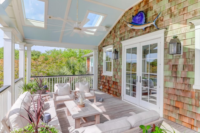 932 Middle St, Sullivans Island, SC 29482 - wooden deck with french doors and ceiling fan