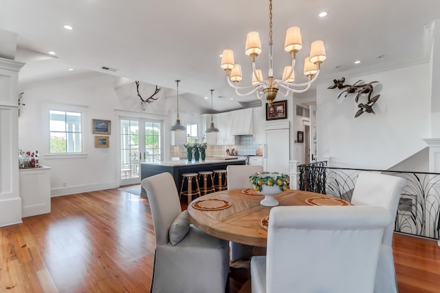 932 Middle St, Sullivans Island, SC 29482 - dining space featuring a chandelier, light wood finished floors, recessed lighting, and lofted ceiling