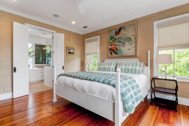 932 Middle St, Sullivans Island, SC 29482 - bedroom featuring wood finished floors, recessed lighting, and ensuite bath