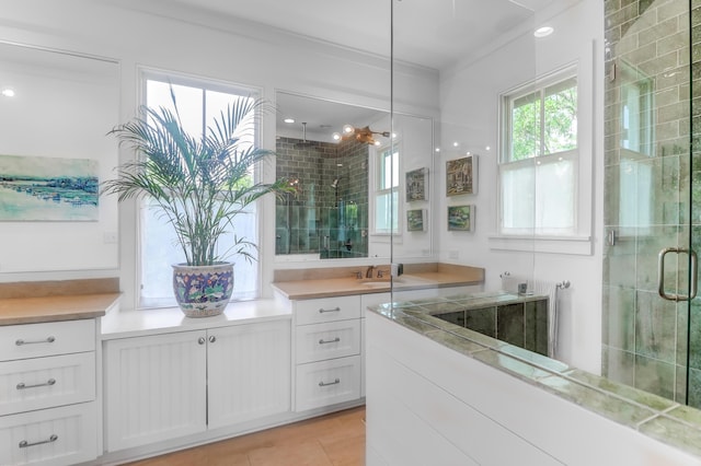 932 Middle St, Sullivans Island, SC 29482 - bathroom featuring a shower stall, vanity, tile patterned flooring, and ornamental molding
