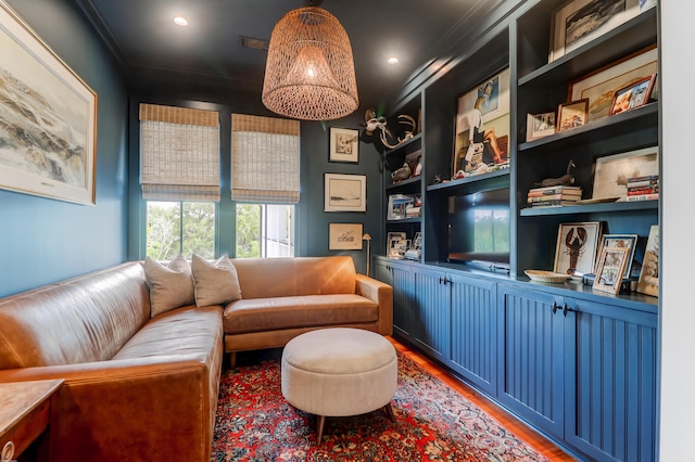 932 Middle St, Sullivans Island, SC 29482 - living area with light wood finished floors, ornamental molding, built in features, and recessed lighting