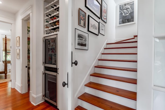 932 Middle St, Sullivans Island, SC 29482 - staircase featuring wood finished floors and baseboards