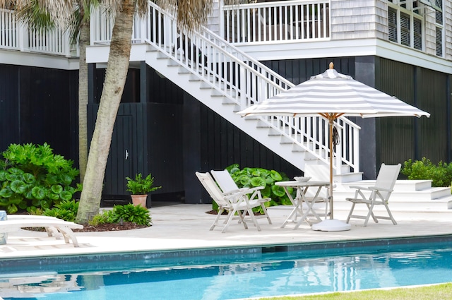932 Middle St, Sullivans Island, SC 29482 - view of swimming pool with stairway and a patio area