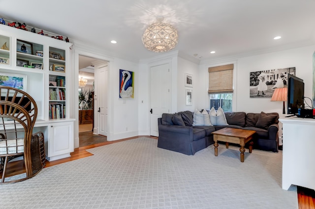 932 Middle St, Sullivans Island, SC 29482 - living room with a chandelier, recessed lighting, wood finished floors, crown molding, and built in features