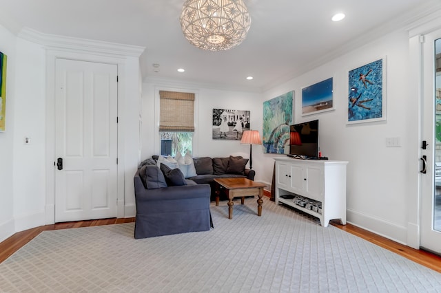 932 Middle St, Sullivans Island, SC 29482 - living room featuring wood finished floors, a chandelier, recessed lighting, and ornamental molding