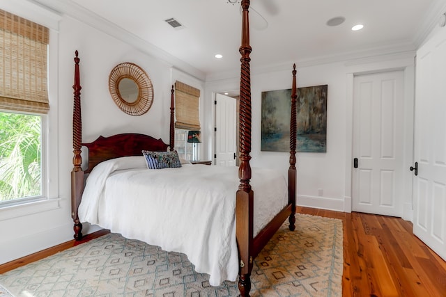932 Middle St, Sullivans Island, SC 29482 - bedroom with wood finished floors, recessed lighting, ornamental molding, and ceiling fan