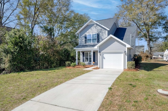 view of front of home with a garage, driveway, a front lawn, and a shingled roof