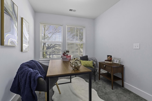 office with baseboards, visible vents, and carpet floors