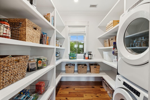 1809 Rushland Grove Ln, Johns Island, SC 29455 - storage area with stacked washer and clothes dryer