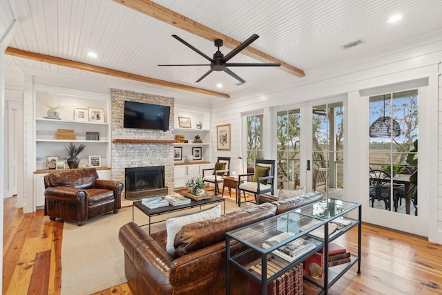 1809 Rushland Grove Ln, Johns Island, SC 29455 - living room with a stone fireplace, a ceiling fan, light wood-type flooring, plenty of natural light, and recessed lighting