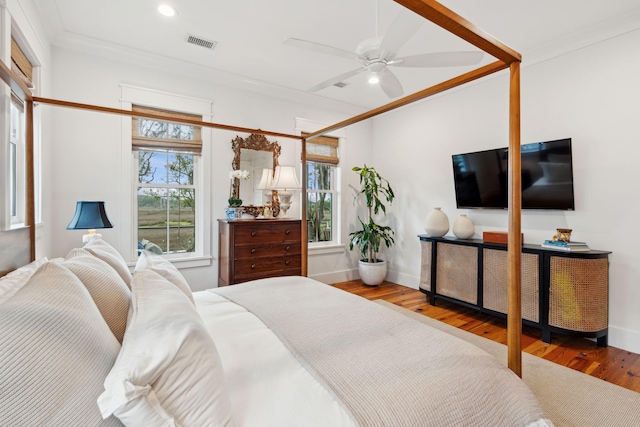 1809 Rushland Grove Ln, Johns Island, SC 29455 - bedroom with wood finished floors, recessed lighting, crown molding, and a ceiling fan