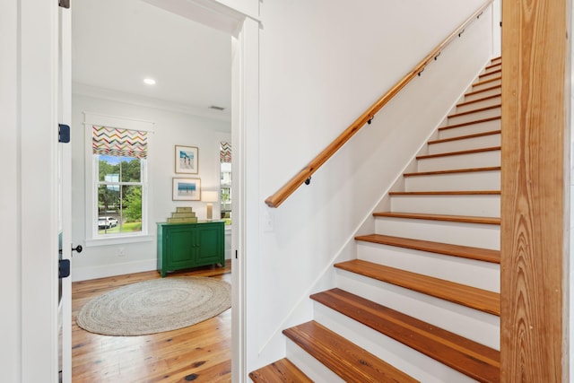 1809 Rushland Grove Ln, Johns Island, SC 29455 - stairway with wood finished floors, ornamental molding, and recessed lighting
