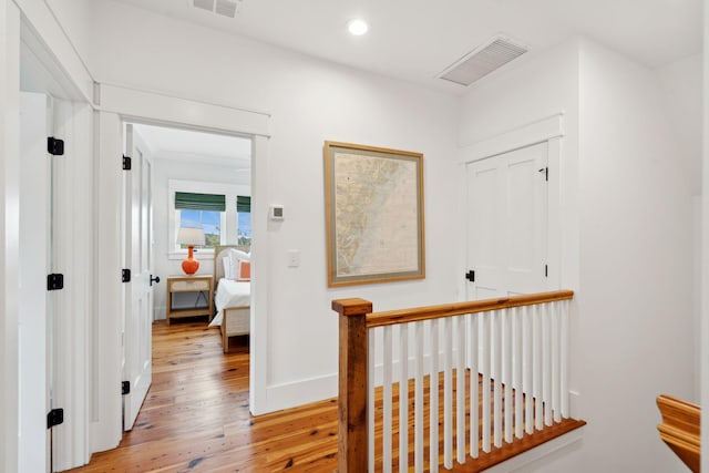 1809 Rushland Grove Ln, Johns Island, SC 29455 - hall featuring light wood-style floors, an upstairs landing, and recessed lighting