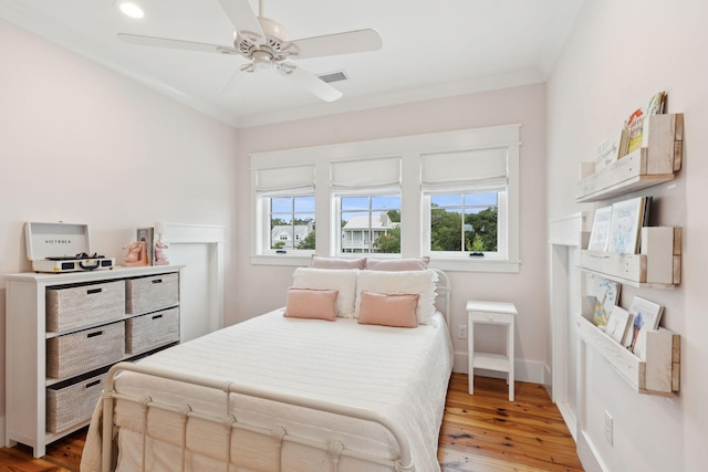 1809 Rushland Grove Ln, Johns Island, SC 29455 - bedroom featuring light wood-style floors, a ceiling fan, and ornamental molding