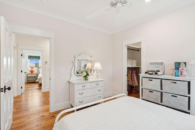 1809 Rushland Grove Ln, Johns Island, SC 29455 - bedroom featuring light wood-style flooring, a spacious closet, crown molding, and a closet