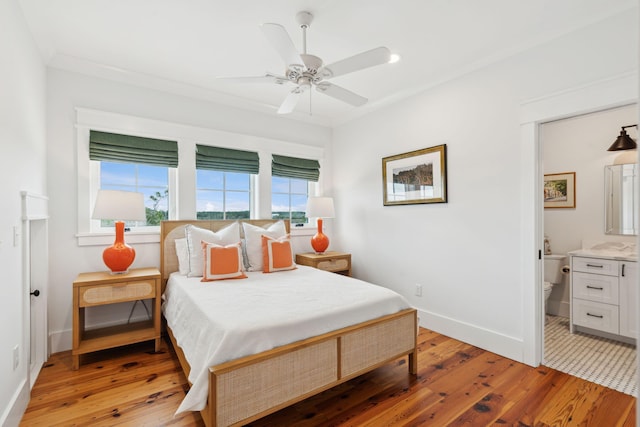 1809 Rushland Grove Ln, Johns Island, SC 29455 - bedroom featuring light wood-type flooring, connected bathroom, and a ceiling fan